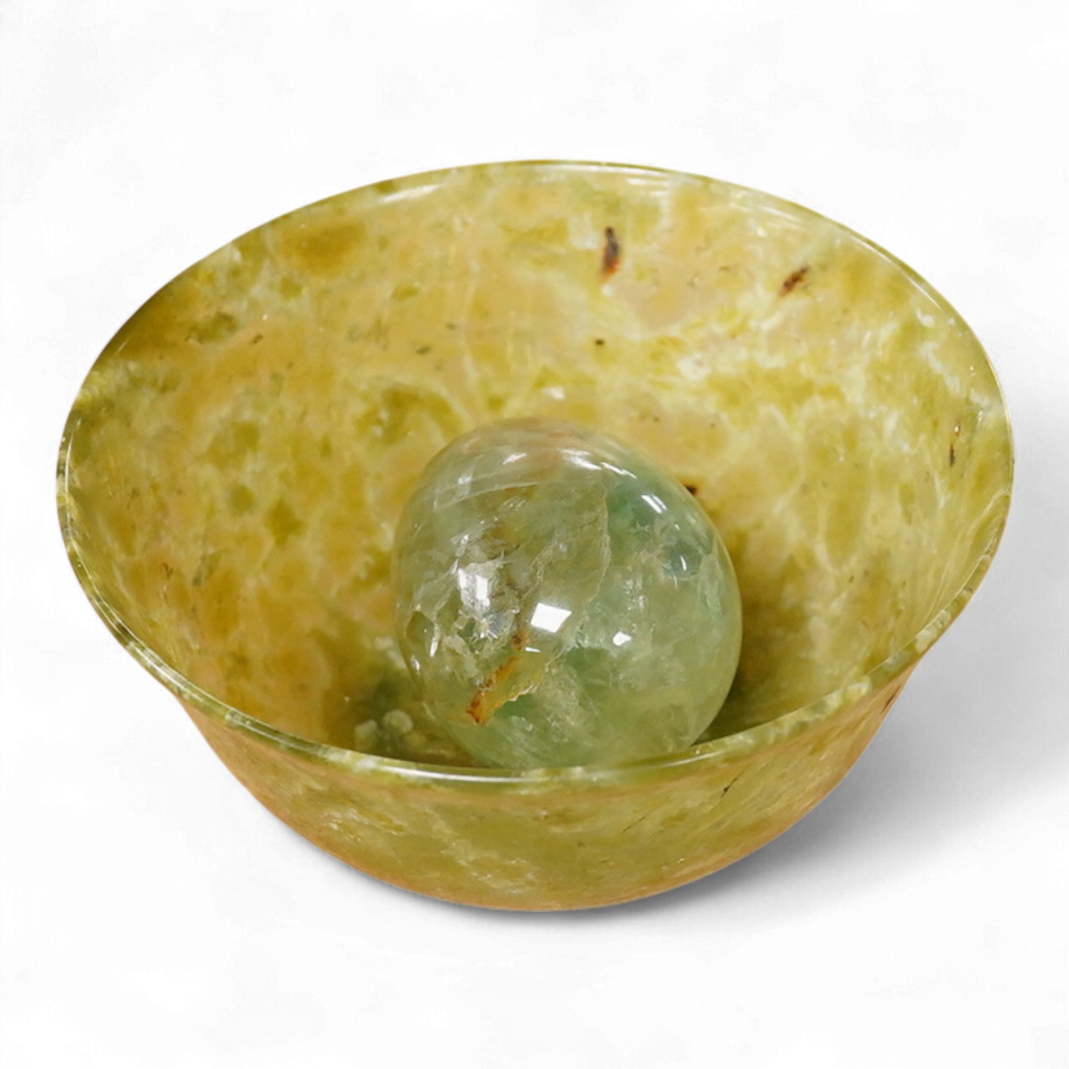 A Chinese bowenite jade bowl and a green quartz egg paperweight, 13cm